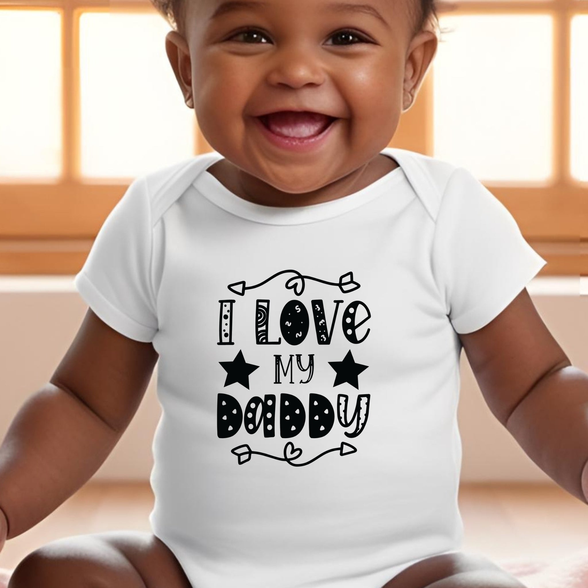 Baby wearing a white onesie with 'I Love My Daddy' text. Gifts for dad. Stocking Filler