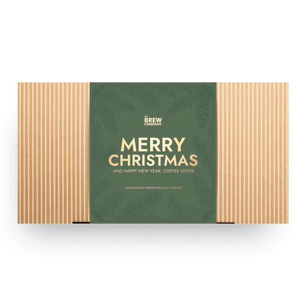 Pack of coffee pods with 'Merry Christmas' message on a green background - Gifts for Dad. Stocking Filler
