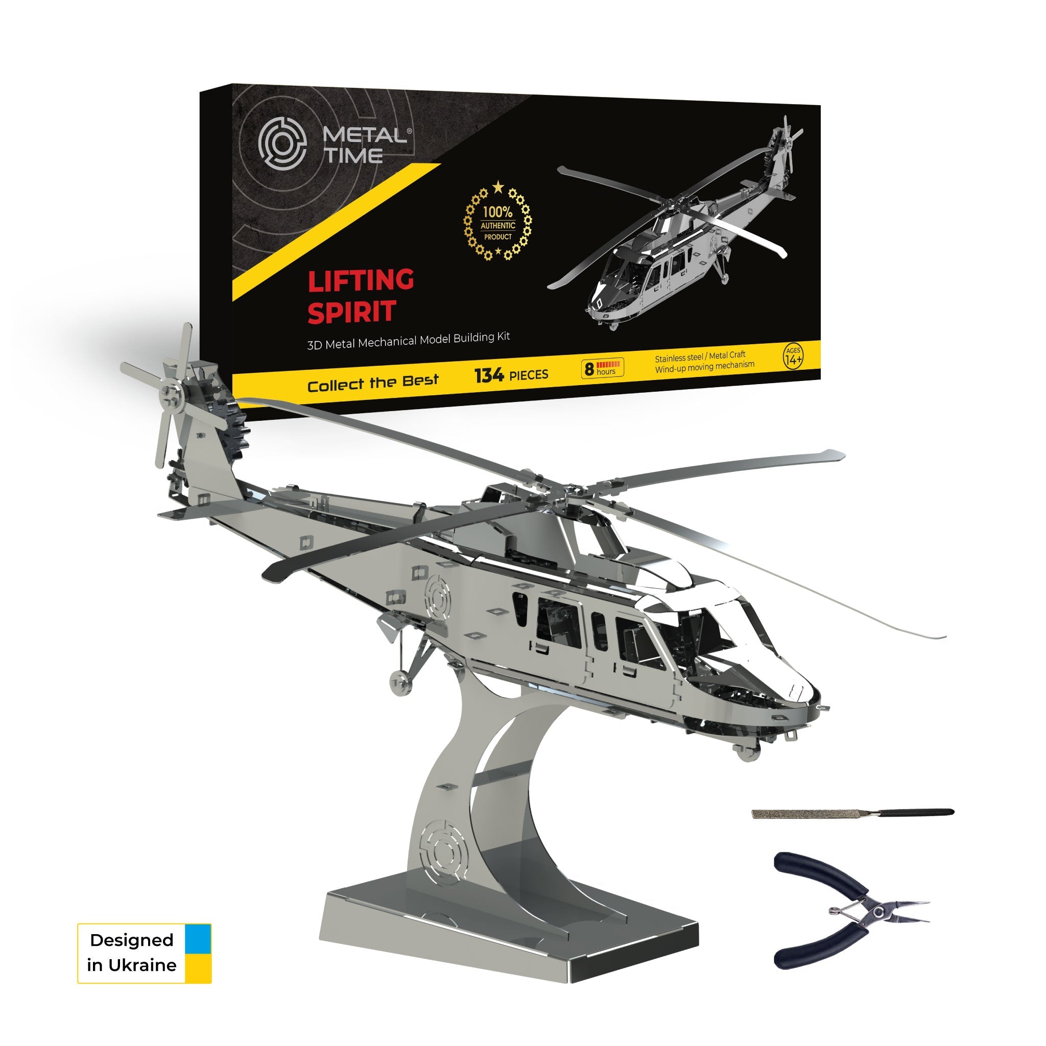 Metal helicopter model kit with packaging and tools on a white background. Gift for dad